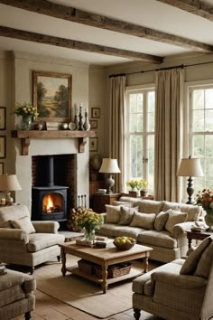 a living room filled with furniture and a fire place in the middle of a room