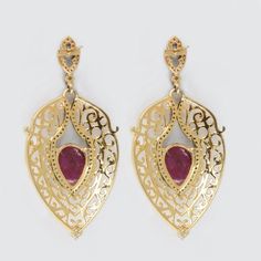 ⚫ This Earrings made with ruby & diamonds in 14k yellow gold, 925 sterling silver,⚫ Pave Diamond Gemstone Earrings 925 Sterling Silver Jewelry.⚫ Gemstone Earrings, Diamond Earrings , Silver Earrings , Everyday Jewelry⚫ Special customize for Mother's day, Anniversary, Birthday Gift, Valentine, Christmas. ⚫ Item Details:Gross Weight:12.64 Grams14k Yellow Gold Weight:0.322 Grams925 Sterling Silver Weight:10.42 GramsDiamond Weight:0.89 CaratsGemstone Weight:8.6 CaratsItem Size: 57 x 27 mmItem SK Elegant Hand Set Teardrop Diamond Earrings, Elegant Hand-set Teardrop Diamond Earrings, Luxury Dangle Teardrop Earrings For Anniversary, Fine Jewelry Teardrop Bridal Earrings With Elegant Design, Luxury Pierced Chandelier Earrings For Formal Events, Teardrop Bridal Earrings With Elegant Design, Exquisite Bridal Earrings For Formal Occasion, Elegant Rose Gold Earrings For Festive Occasions, Elegant Rose Gold Festive Earrings