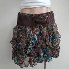 Wet Seal * Missoni Ruffle * Print * Skirt Size Large New With Tags. 100% Polyester Measurements(Laying Flat): Waist: 14.5+"(Stretchy) Top To Bottom(Entire Length): 16" Thank You For Looking Chic Brown Ruffled Bottoms, Brown Ruffled Skirted Bottoms, Brown Ruffled Skirt Bottoms, Brown Skirted Bottoms With Ruffled Detail, Brown Skirted Bottoms With Ruffled Skirt, Bohemian Brown Bottoms With Ruffles, Brown Ruffled Bottoms For Spring, Fitted Brown Bottoms With Ruffles, Spring Brown Ruffled Bottoms