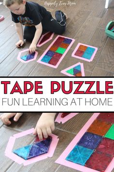 a young boy playing with tape puzzles on the floor