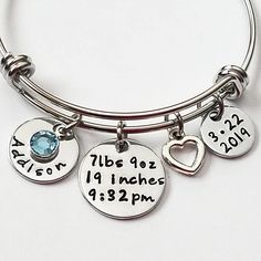 Free Shipping on orders $35 and over. Item Features: 1 - Stainless Steel Adjustable Bangle 1 - Date Charm 1 - Personalized name charm (you choose the name) 1 - Birthstone crystal (you choose the month) 1 - Birth Stats Charm 1 - Silver heart charm Bracelet will come packaged in a pretty organza pouch ready for gift giving. We cannot stamp on the backs of any of our hand stamped items.  To see more Bracelets for Mom click the link below: https://www.etsy.com/listing/598641237/baby-name-bracelet-mom-bracelet-birthday?ref=shop_home_active_10&frs=1 https://www.etsy.com/listing/222557249/baby-name-bracelet-new-mom-gift-new-baby?ga_search_query=your%2Bfirst%2Bbreath&ref=shop_items_search_1&frs=1 https://www.etsy.com/listing/399828117/new-mom-gift-push-gift-personalized?ga_search_query=your%2Bfirs Nickel-free Charm Bracelet For Birthday And Mother's Day, Adjustable Hand Stamped Jewelry For Birthday Gift, Personalized Adjustable Dangle Charm Bracelet, Nickel-free Charm Bracelet For Birthday, Nickel Free Round Charm Bracelet For Birthday, Hypoallergenic Charm Bracelet For Birthday, Adjustable Round Jewelry For Birthday, Nickel-free Round Charm Bracelet For Birthday, Adjustable Round Jewelry For Birthdays