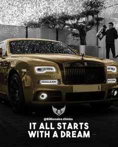 a gold car parked in front of a building with the words, it all starts with a dream