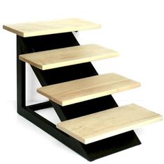 three tiered wooden shelf with black metal frame and wood top, on white background