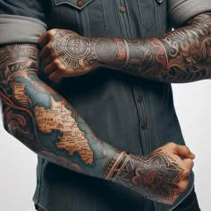 a man with many tattoos on his arms