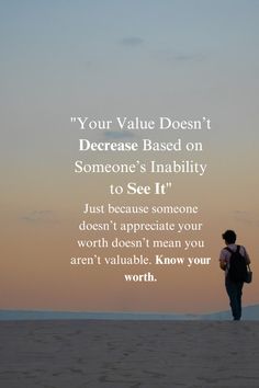 a person standing on top of a beach next to the ocean with a quote above it that reads, your value doesn't increase based on someone's inability