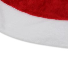 a red and white santa claus hat on a white background