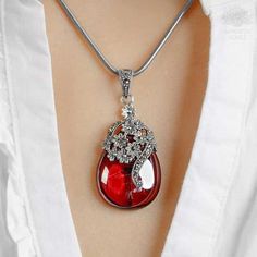 Feeling of Unconditional Love! Connect with the light of heart and love with this Gemstone Necklace - Genuine Plenary Pendant. With this necklace, you will feel encouraged and inspired to spread the universal feeling of love. Soothing Energy Red garnet is not only a stunning gemstone but it also radiates soothing warmth. The stone controls overwhelming emotions and improves sleep quality after a long, tiring day. More Positivity Green chalcedony stone is a type of quartz that absorbs negativity. Spiritual Jeweled Necklaces, Spiritual Teardrop Pendant Necklace For Wedding, Bohemian Crystal Necklace For Gift, Bohemian Crystal Necklace For A Gift, Anniversary Crystal Pendant Necklace, Teardrop Jeweled Necklace, Spiritual Teardrop Pendant Necklace With Stones, Bohemian Gemstone Heart Pendant Necklace, Spiritual Teardrop Pendant Necklace