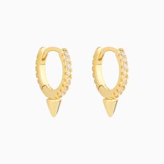 Make a bold statement with these Punk Rivet Hoop Earrings! Crafted with S925 needle, gold/silver plated brass, these earrings are stylish and cool. Show off your unique style and make a lasting impression. Material: -Gold/silver plated brass-S925 needle Quantity & Measurement：-Gauge: 20g | 0.8mm-Diameter: 10mm | 0.39"-Include: a pair Edgy Hoop Earrings For Pierced Ears, Edgy Small Hoop Pierced Earrings, Edgy Gold Hoop Earrings For Pierced Ears, Edgy Gold Cartilage Earrings, Edgy Single Small Hoop Earring, Single Small Hoop Earring In Edgy Style, Edgy Gold Pierced Earrings, Amazing Amy, Helix Hoop