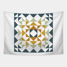 a wall hanging with an abstract geometric design in yellow, green and blue colors on it