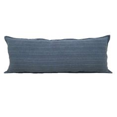 a blue pillow on a white background