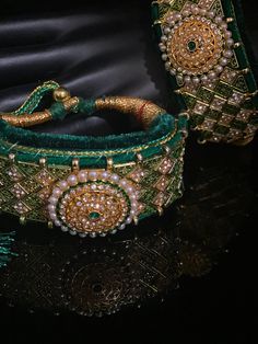 Green Velvet Pounchi ,Adorable Bracelet/ gold Bead Beaded, Resham Thread Handmade Ceremonial Jewelry For Festivals, Traditional Adjustable Jewelry With Latkans, Green Chandbali Jewelry For Rituals, Ceremonial Jewelry Sets With Latkans For Diwali, Adjustable Kundan Necklace With Tilla For Festivals, Green Bracelet Jewelry For Festivals, Bohemian Bracelets For Diwali Ceremonial, Adjustable Temple Jewelry Bracelets For Diwali, Traditional Jewelry With Stone Work For Festivals