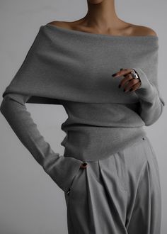 Color: Grey Midweight stretch fabric Regular fit Off-the-shoulder detailing  Fold over detailing Slip-on style  Unlined  72% Rayon 28% Polyester  Dry Clean Imported Sweater Tops, Knit Bottom, Grey Knit Sweater, Off Shoulder Sweater, Long Sleeve Knit Sweaters, Solid Tops, Off Shoulder Tops, Shoulder Sweater, Long Sleeve Knit