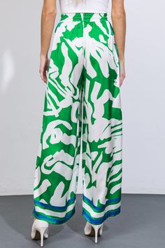 Indulge in luxury with these chic woven satin pants, boasting a sophisticated tie-front elasticized waist and a wide leg design. Perfect for art openings or exclusive gatherings, these pants exude elegance and taste. Matching top IT12999Details:Self : 100% PolyesterSize & Fit- Model is 5`10" And Wearing Size Small- Measurements Taken From Size Small- Approx. Length: 44" Satin Pant, Satin Pants, Flying Tomato, Leg Design, Matching Top, Fitness Models, Wide Leg, Satin, Boutique