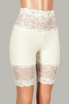 Elegant Stretch Shorts, Stretch Bottoms With Delicate Lace In Short Length, Beige Lace Trim Shorts, Elegant White Lace Shorts, Stretch Lace Trim Mid-thigh Bottoms, High Waist Lace Bottoms With Lace Trim, Fitted Cream Bottoms With Lace Trim, Fitted Beige Lace Bottoms, Stretch Mid-thigh Bottoms With Lace Trim