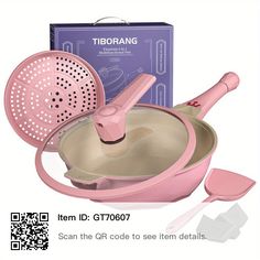 a pink pot and pan set with matching utensils in front of the box