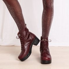 The Jonna lace-up boot in soft Plum leather makes a chic statement. The boot features a low, chunky clog-style heel in contrasting black and a pull-tab for easy wear. The removable anatomical sole provides optimal support, while our unique flexible sole means the Jonna boot can be worn comfortably all day long. Handmade in Portugal Unique Calou sole, soft and lightweight removable anatomic footbed Heel height 5,5 cm / 2,16 in Shaft height 14 cm / 5,52 in Clog Style, Clogs Style, Slipper Shoes, Shoe Care, Easy Wear, Lace Up Boots, Low Heels, Plum, Clogs