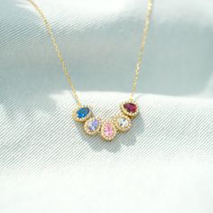 DESCRIPTION Authenticate your commitment to motherhood with this beautiful and purposeful 1-14 Teardrop Birthstone Necklace. Craft a special piece for yourself - pick from up to 14 birthstones representing your kids. Whether it's a birthday, mother's day, anniversary, Valentine's Day, this necklace is sure to make her heart flutter. SPECIFICATIONS Length: 15" with 2" ExtensionStone: AAA Grade Cubic Zirconia Heart Flutter, Personalized Gifts For Mom, Necklace Craft, Necklace Personalized, Birthstone Necklace, Gift For Mom, Birthstone, Gifts For Mom, Cubic Zirconia