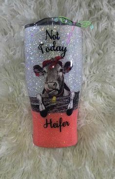 a red and pink cup with a cow on it that says not today heifer