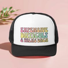 This funny "Expensive Difficult And Talks Back" summer trucker hat comes with a cheeky and sassy phrase that reflects your personality. Whether it's a witty quip or a fierce slogan, these hats do the talking for you. Let your headwear express your mood, attitude, and unapologetic confidence. ♥ Product details: .: Sold separately .: Material: 100% polyester foam front with 100% nylon mesh weave back .: One size fits most (22.8"/58cm) .: Adjustable snap closure ♥ Shipping: A tracking number will b Adjustable Trucker Hat With Letter Print And Curved Bill, Funny Letter Print Trucker Hat, Novelty Adjustable Baseball Cap With Letter Print, Novelty Letter Print Adjustable Baseball Cap, Adjustable Fashion Baseball Cap With Letter Print, Funny Snapback Hat With Letter Print, Funny Snapback Cap With Letter Print, Funny White Adjustable Trucker Hat, Funny Black Trucker Hat With Letter Print