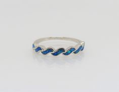 Vintage Sterling Silver Blue Opal Ring ...Marked 925...Total of weights 1.8grams...Size 7...Measure of Face 3.8MM...It's in very good condition. Adjustable Blue Stamped 925 Jewelry, Formal Blue Sterling Silver Stackable Rings, Formal Blue Stackable Rings, Blue Sterling Silver Stackable Jewelry, Blue Sterling Silver Round Band Jewelry, Blue Sterling Silver Opal Promise Ring, Elegant Blue Opal Ring Stamped 925, Blue Round Stackable Rings For Formal Occasions, Blue Opal Ring Stamped 925 For Gift