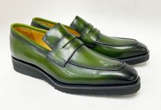 Calfskin Slip-On Penny Loafer Olive Gorgeous Calfskin slip-on Penny Loafer from our Exclusive Maurice collection features full Leather Lining, a clean welt and a tone on tone Lightweight Rubber Sole! Green Formal Slip-ons With Round Toe, Green Dress Shoes With Rubber Sole For Office, Formal Green Moccasins With Leather Sole, Classic Green Moccasins For Formal Occasions, Green Leather Sole Slip-on Moccasins, Green Slip-on Moccasins With Leather Sole, Green Slip-on Moccasins For Business, Office Green Dress Shoes With Rubber Sole, Green Office Dress Shoes With Rubber Sole