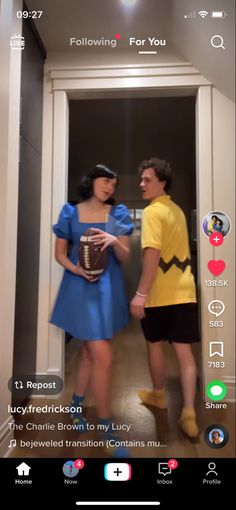 a man and woman dressed in costumes talking to each other while standing in front of an open door