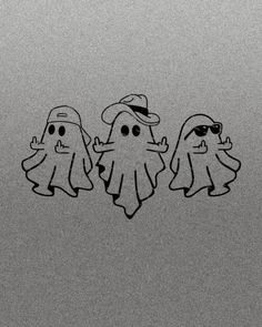 three ghost stickers are on the side of a refrigerator door, one is wearing sunglasses and the other has a hat