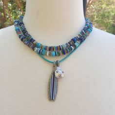 "All the colors of the ocean are combined in this long beaded necklace. Turquoise, lapis, larimar, blue agate and more! Wear this necklace single or double. Beautiful by itself or layer it with your other favorite pieces to create your own color story. Necklace: 37\" plus extender Layer this necklace with: https://www.etsy.com/listing/548308190/turquoise-and-diamonds-pendant-turquoise?ref=shop_home_active_159&frs=1&crt=1 or: https://www.etsy.com/listing/818339679/turquoise-necklace-handk Turquoise Single Strand Beaded Bohemian Necklace, Turquoise Single Strand Beaded Necklace In Bohemian Style, Double Strand Turquoise Beaded Necklace For Beach, Turquoise Double Strand Beaded Necklace For Beach, Blue Double Strand Bohemian Turquoise Necklace, Bohemian Double Strand Turquoise Necklace, Bohemian Blue Double Strand Turquoise Necklace, Artisan Blue Double Strand Beaded Necklace, Blue Bohemian Double Strand Necklaces