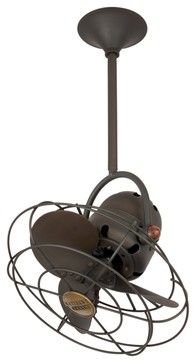 an industrial style ceiling fan with two lights on each side and a metal cage around it