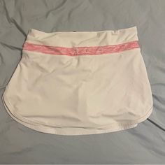 Basically Brand New! White Stretch Mini Swim Skirt, White Stretch Lined Skort, White Stretch Skort With Lined Skirt, White Lined Mini Swim Skirt, White Mini Tennis Skirt With Lining, White Stretch Skirt With Built-in Shorts, White Sports Skirt For Spring, Spring Sports White Skirt, Stretch White Skort