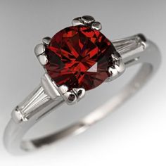 Classic Burgundy Ruby Ring, Classic Diamond Ring With Round Gemstone, Classic Burgundy Ruby Ring For Formal Occasions, Elegant Ruby Ring With Diamond And Round Stone, Formal Garnet Ring With Center Stone, Classic White Gold Ruby Ring With Round Stone, Formal Garnet Birthstone Ring With Center Stone, Classic Ruby Ring With Round Stone For Formal Occasions, Classic Garnet Rings For Wedding