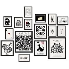 an assortment of framed art pieces on a white wall with black and white images above them