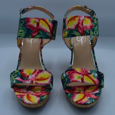 A Floral-Patterned, Open-Toe Wedge Sandal With An Ankle Strap And Adjustable Buckle. The Shoe Features A Multicolored Fabric Upper With A Tropical Flower And Hawaiian Theme. New In Box. Closed Toe Fabric Wedge Sandals For Vacation, Summer Fabric Sandals With Wedge Heel, Fabric Wedge Sandals For Summer, Fabric Wedge Sandals With Round Toe For Vacation, Fabric Open Toe Wedge Sandals For Vacation, Open Toe Fabric Wedge Sandals For Vacation, Fabric Wedge Heel Sandals For Summer, High Heel Fabric Sandals For The Beach, Summer Fabric Wedge Sandals