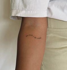 a woman's arm with writing on it