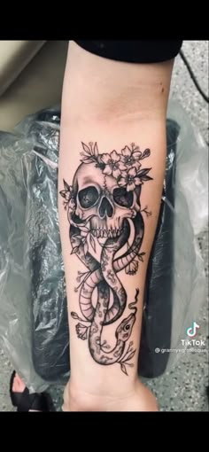 a person with a tattoo on their arm and the image is taken from an instagramr