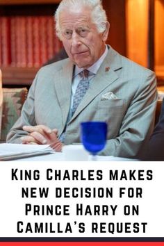 a man sitting at a table with a book in front of him and the words king charles makes new decision for prince harry on canada's request