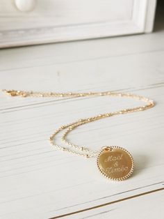 Very beautiful personalized gold plated necklace. It is composed of a single-round beaded medallion and a delicate ball-shaped mesh chain. Engrave a first name, a date, initials or a text of your choice. Material: 750 thousandths (18 carat) gold plated. Nickel and cadmium free. Hypo-allergenic. The thickness of gold deposited is 3 microns minimum. The last finishing layer is made from 980/000 gold which prevents any oxidation. All our gold-plated jewelry is guaranteed for 10 years against any pl Beaded Medallion, Gold Deposit, Name Necklaces, Gold Plated Necklace, First Name, Etsy Fashion, Gold Plated Jewelry, Name Necklace, Gift Birthday