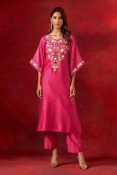 Fuchsia pink silk chanderi kaftan featuring floral pattern with multi-color resham, beads, cut dana, and sequin embroidered yoke and sleeve borders. Paired with straight pant and slip., Fit: Relaxed Pink Silk Kaftan With Zari Work, Silk Pink Kaftan With Resham Embroidery, Pink Silk Kaftan With Resham Embroidery, Pink Silk Palazzo Set For Diwali, Diwali Pink Silk Palazzo Set, Pink Silk Kurta With Cutdana Detail, Pink Silk Kurta With Cutdana, Designer Pink Kaftan For Diwali, Pink Kaftan For Diwali