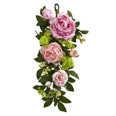 pink and green flowers are hanging from a hook