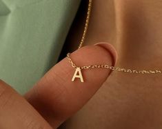 14k Solid Gold Tiny Initial Tag Necklace by Babeina, Custom Engraved Letter Pendant Necklace in Dainty Chain, Christmas Gift, Multi Tag Name - Etsy Dainty Letter Necklaces For Everyday Wear, Dainty Letter Necklaces For Everyday, Dainty Letter Necklace For Everyday Wear, Everyday Letter Jewelry For Mother's Day, Everyday Letter Necklaces, Everyday Letter Shaped Necklaces, Vintage Initial Pendant Charm Necklace As Gift, Minimalist Letter Jewelry As A Gift, Minimalist Letter Jewelry For Gifts