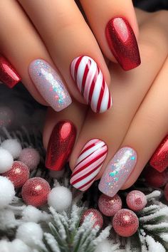 Get festive with these classic red and white candy cane nails featuring a stunning glitter accent! The traditional stripes shine brightly with an eye-catching glitter finish on the accent nails, making your manicure pop while keeping it chic and stylish. Perfect for holiday parties or cozy gatherings, these nails are a sweet way to celebrate the season! 🎄✨💅 #NailArt #CandyCaneNails #GlitterNails #ChristmasNailDesigns #HolidayNailInspo Christmas Fingernails Ideas, Holiday Nails Designs Christmas, Red Nails For Holidays, Winter Nails Candy Cane, Christmas Nail Designs Easy Short Nails, Christmas Nails Festive, Christmas Nail Glitter Designs, Candy Cane Nails Almond Shape, French Candy Cane Nails