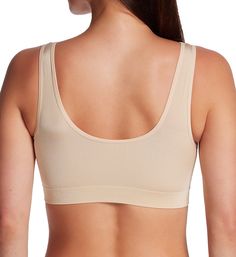 This super soft bralette brings you light support and advanced comfort. Wear it under tops and jackets for a flash of contrast color! Features removable light foam padding. Seamless, molded wireless cups are lined, with light foam removable padding (cookies) for shape and support. Stretchy molded cups adapt to breasts that are are slightly uneven. Knit-in, seamless center panel is tall, and helps separate breasts. Covered elastic underband for additional support. Elasticized top cup edge for a m Eileen West, Wireless Bra, Comfort Wear, Custom Fit, Pullover Styling, Contrasting Colors, Bralette, Flash, Wear It