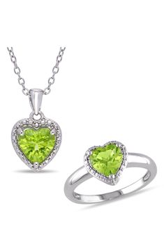 Heart-shaped peridot stones adorn the ring and necklace of this exquisite set that makes the perfect gift for friends, family and yourself. Set includes one ring and one necklace 18" length;  1/2" pendant diameter (necklace) Total peridot weight: 2.66ct. Sterling silver/peridot Imported Fine Jewelry Heart Shaped May Birthstone, Fine Jewelry Heart-shaped May Birthstone, Fine Jewelry Green Heart Jewelry, Heart Cut Gemstone Jewelry For Mother's Day, Mother's Day Gemstone Heart Cut Jewelry, Green Heart Shaped Fine Jewelry, Green Heart-shaped Fine Jewelry, Mother's Day Heart Cut Gemstone Jewelry, Anniversary Peridot Jewelry With Diamond Accents