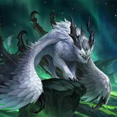 a white dragon sitting on top of a rock next to an aurora borel sky