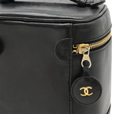 General: Brand: Chanel Design: Type: Handbag, Pouch, Vanity bag Material: Leather Leather/Fur Type: Lambskin Color: Black Gender: Women,Men Size: Size (HxWxD): 17cm x 14.5cm x 12.5cm / 6.69'' x 5.7'' x 4.92'' Included Items: Accessories: Shop card Accessories Notice: Before purchasing, please refer to the images of the accessories included with the item. Condition: Condition: Used (good) Ranking: Rank AB Used - Traces of usage, scratches / dirt can be seen but generally in good condition Seller High-end Box Bag With Gold-tone Hardware, High-end Gold-tone Pouch Box Bag, Luxury Top Handle Cosmetic Bag For Shopping, Designer Travel Pouch Box Bag, Designer Pouch Box Bag For Travel, Designer Travel Box Bag Shaped As Pouch, Leather Satchel With Dust Bag In Rectangular Shape, Designer Formal Cosmetic Bag Rectangular, Designer Formal Rectangular Cosmetic Bag