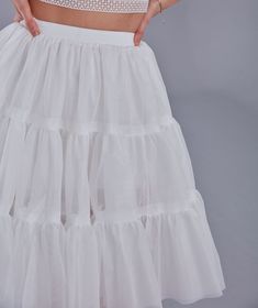 Step into elegance with our beautifully crafted voile petticoat. Designed to add volume and a touch of sophistication to any outfit, this petticoat is perfect for weddings, parties, or even everyday wear. The elastic band ensures a comfortable fit, accommodating up to 36 inches with ease. Made from lightweight and breathable voile, this petticoat provides the perfect amount of fluff without feeling bulky. Whether you're dressing up for a special occasion or looking to enhance your daily attire, Quinceanera Bouquet, Hand Bouquet, Wedding Veil, Bridal Veil, Bridesmaid Bouquet, Petticoat, Quinceanera, Bridal Accessories, Elastic Band