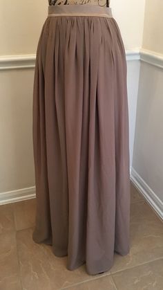 This Skirt is made of the softest chiffon and would be the perfect Wedding Skirt or Bridesmaid Dress. It can be made in ANY color, ANY length, and ANY size. Add Color desired in Personalization area when purchasing. ALL ITEMS HANDMADE BY ME IN USA Lining and waistband are made with a soft satin fabric of the same or contrasting color as the chiffon. The satin waistband is flat with zipper and hook/eye closure in back. Elastic can be added to the back of the waistband, however only allows for a l Flowy Chiffon Maxi Dress For Wedding, Pleated Chiffon Tiered Maxi Skirt, Pleated Chiffon Maxi Skirt With Flowy Fit, Chiffon Pleated Flowy Maxi Skirt, Flowy Chiffon Bridesmaid Skirt, Elegant Long Skirt For Bridesmaids, Elegant Maxi Skirt For Bridesmaid, Elegant Chiffon Gathered Skirt, Pleated Flowy Skirt For Wedding