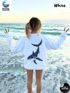 ✨🐋Welcome to EasyWearCollection🐋✨ Embrace the spirit of the ocean with this stylish sweatshirt featuring a detailed shark illustration on the back. Perfect for shark enthusiasts and anyone who loves marine life, this cozy crewneck is an ideal blend of comfort and unique style. ✨How to order             1.Select your product             2.Choose options(size,color)             3.Add to cart and proceed to check out or buy now             4.Wait for shipping process ✨Processing/Shipping time Shirts Detail, Shark Sweatshirt, Shark Illustration, Beach Sweater, Shark Design, Beach Sweatshirt, Shirt Detail, Sea Animal, Whale Shark