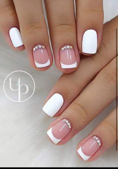 french manies with white and pink designs on the tips are perfect for short nails