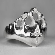 **Please note that we dispatch on Tuesdays unless special delivery express option is paid for** Original design, carved in wax then lost wax cast into solid sterling silver. All of our rings are made in London using recycled silver. First class recorded post included. Unique Hand Cast Sterling Silver Signet Ring, Unique Hand Cast Sterling Silver Engraved Ring, Unique Hand Cast Signet Ring For Anniversary, Hand Cast Engraved Silver Sterling Ring, Symbolic Hand Cast Silver Engraved Ring, Symbolic Silver Ring With Hand Cast Details, Unique Sterling Silver Engraved Ring, Lip Ring, Hand Ring